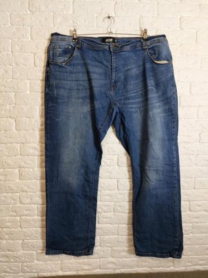 Фірмові стрейчеві джинси 42р. 129321490 фото
