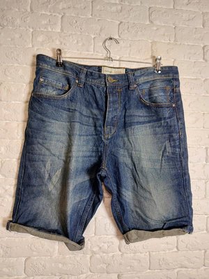 Фірмові джинсові шорти 34р. 128334494 фото